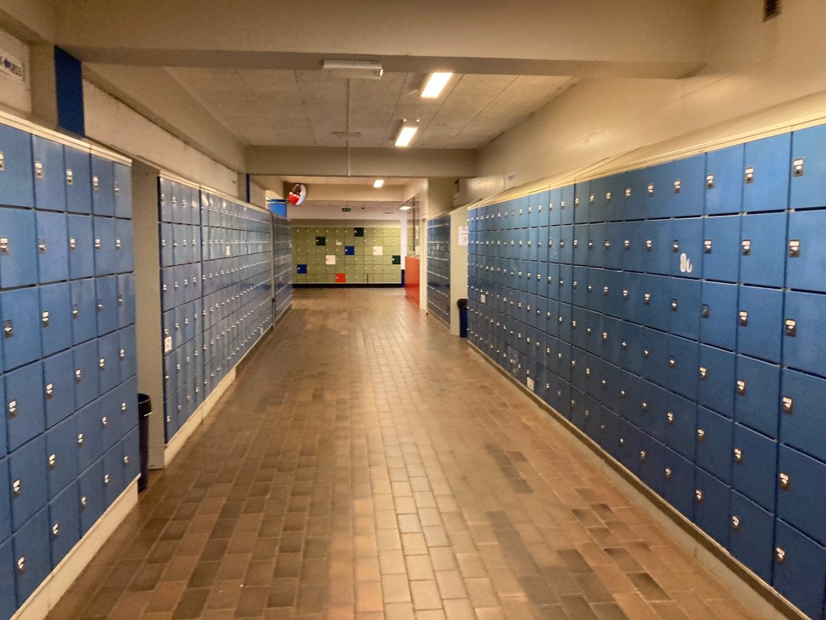 Commercial cleaning crew disinfecting a classroom in a Raleigh, NC school